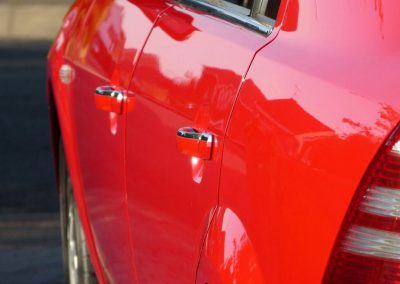 Red Car Rear Left View